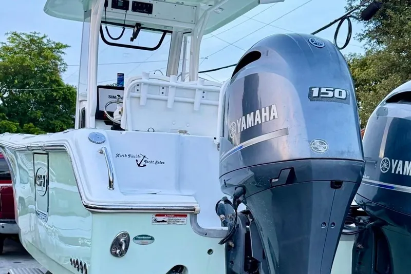 Slide: The Image of 2018 Sea Hunt Gamefish 25 boat with Yamaha 150 engines, rear view. - 16