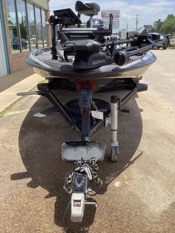 Slide: The Image of A 2023 Skeeter FXR21 boat on a trailer, equipped with Garmin and Humminbird electronics. - 21