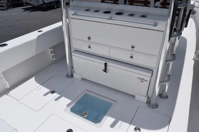 Slide: The Image of Interior of 2027 Contender 39 ST boat with storage compartments and ladder. - 13
