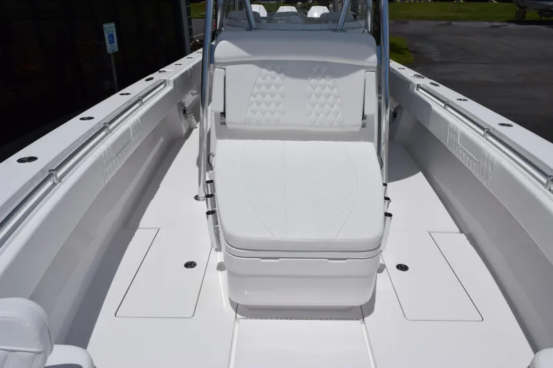 Slide: The Image of 2027 Contender 39 ST boat interior with white seating and sleek design. - 21