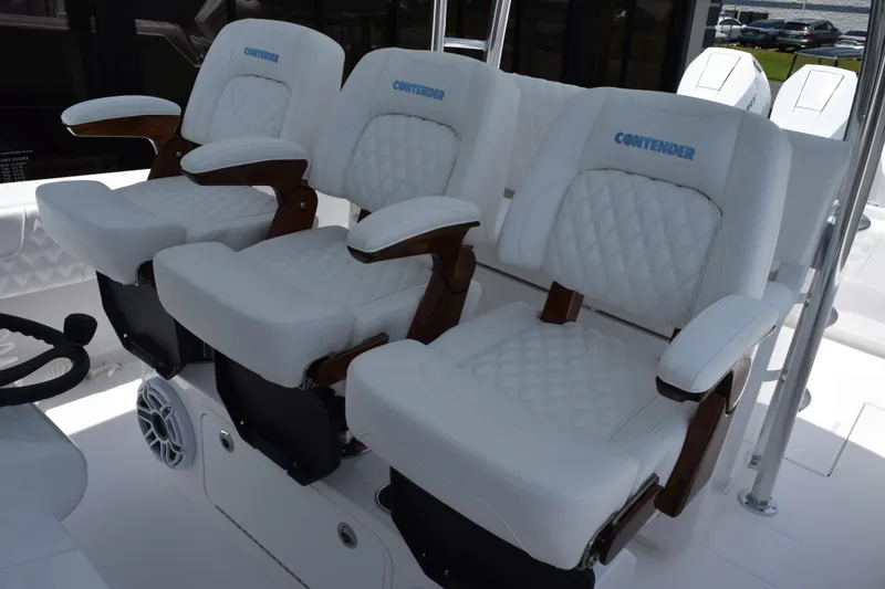 Slide: The Image of Luxury seating on 2027 Contender 39 ST boat with white quilted upholstery. - 16