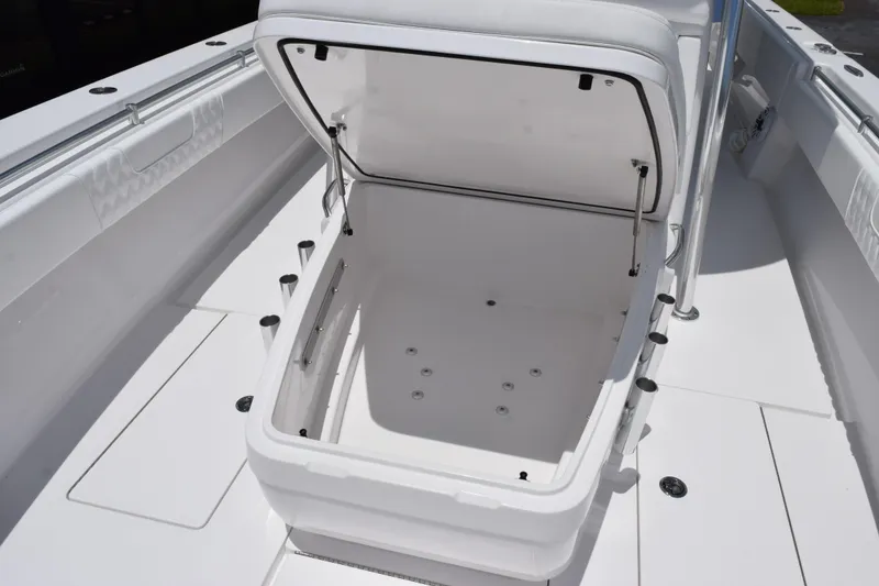 Slide: The Image of Open storage compartment on 2027 Contender 39 ST boat deck. - 36