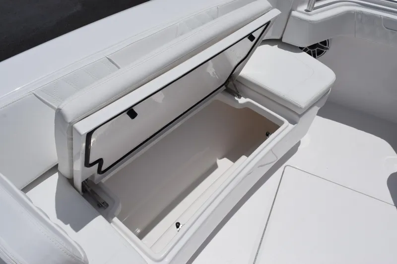 Slide: The Image of Open storage compartment on 2027 Contender 39 ST boat, showcasing spacious interior design. - 39