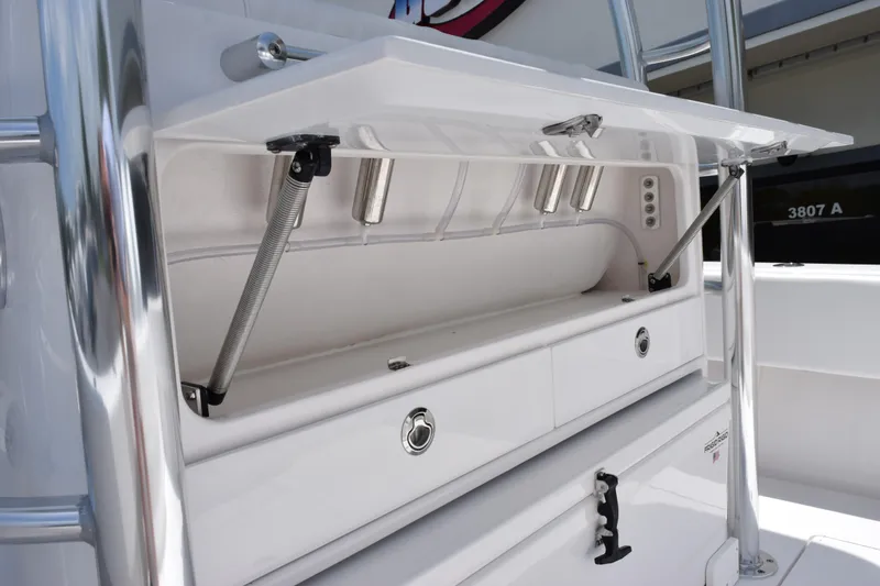 Slide: The Image of Contender 39 ST 2027 boat storage compartment with hydraulic lift and stainless steel fixtures. - 42