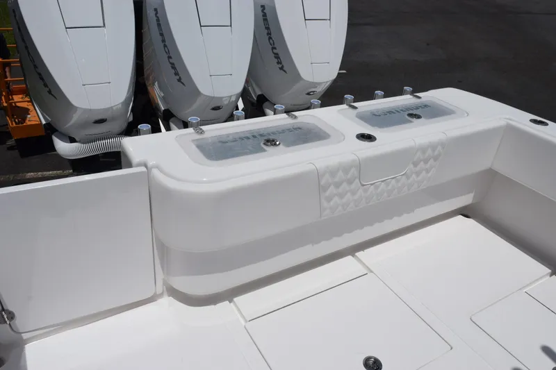 Slide: The Image of 2027 Contender 39 ST boat with Mercury engines and spacious deck layout. - 14