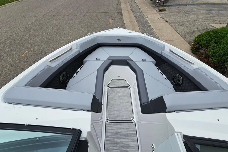 Slide: The Image of 2023 Cobalt R4 boat interior with sleek gray seating and modern design. - 19