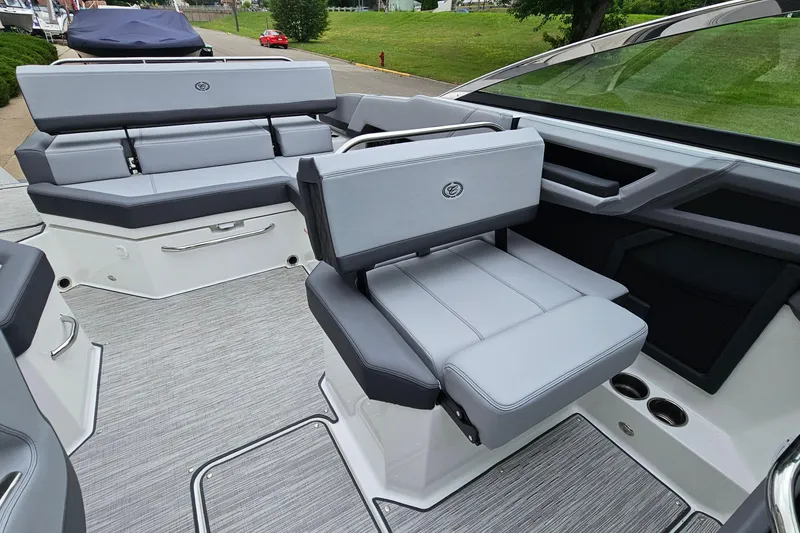 Slide: The Image of 2023 Cobalt R4 boat interior with sleek gray seating and modern design. - 12