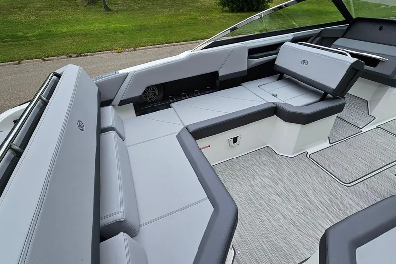 Slide: The Image of 2023 Cobalt R4 boat interior with sleek gray seating and modern design. - 10