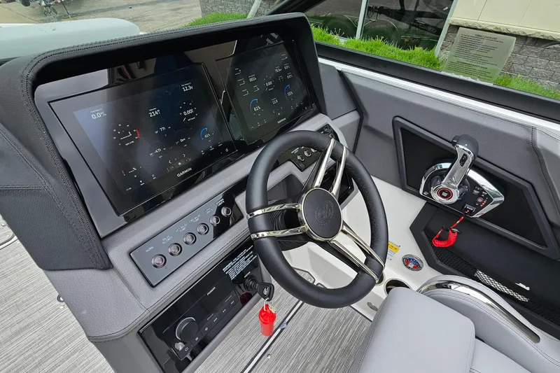 Slide: The Image of 2023 Cobalt R4 boat dashboard with advanced controls and digital displays. - 17