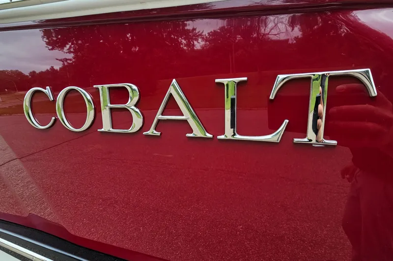 Slide: The Image of Chrome "Cobalt" logo on a red 2023 Cobalt R4 vehicle. - 32