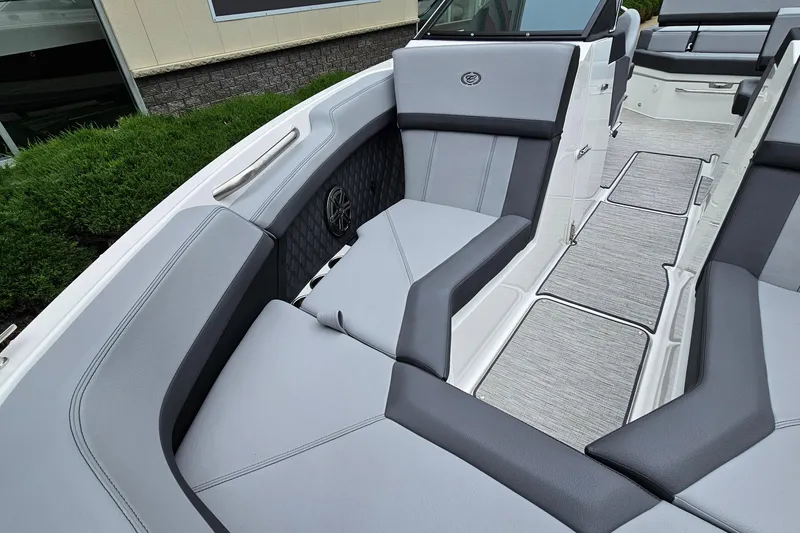Slide: The Image of 2023 Cobalt R4 boat interior with sleek gray seating and modern design. - 22