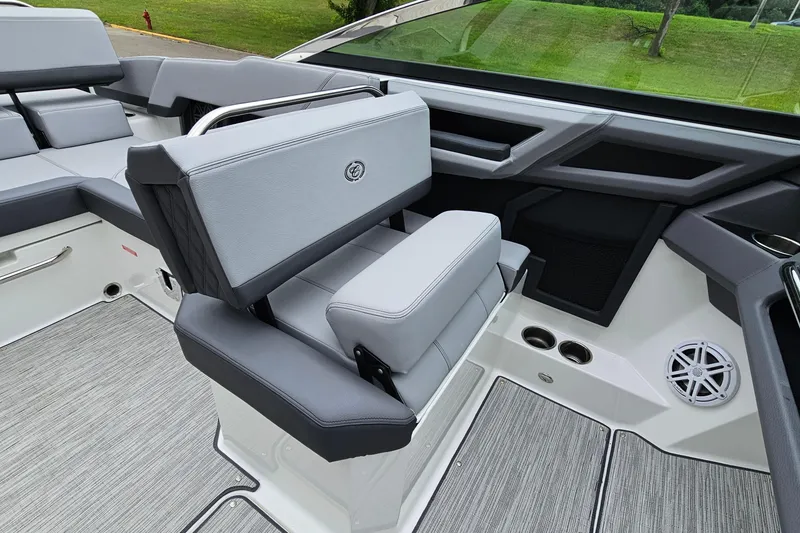 Slide: The Image of 2023 Cobalt R4 boat interior with sleek gray seating and modern design elements. - 13