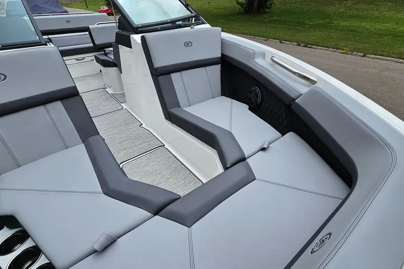 Slide: The Image of 2023 Cobalt R4 boat interior with sleek gray seating and modern design. - 21