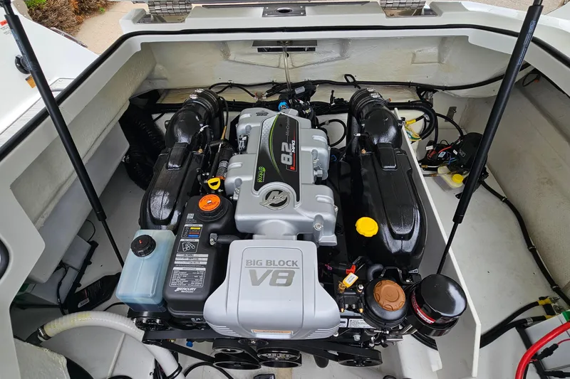 Slide: The Image of Engine compartment of a 2023 Cobalt R4 boat featuring a powerful Big Block V8 engine. - 28