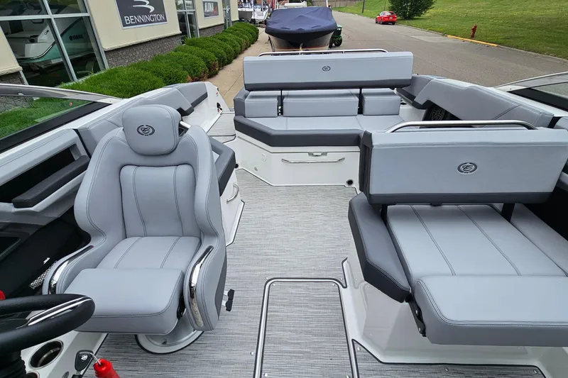 Slide: The Image of 2023 Cobalt R4 boat interior with luxurious gray seating and modern design. - 11