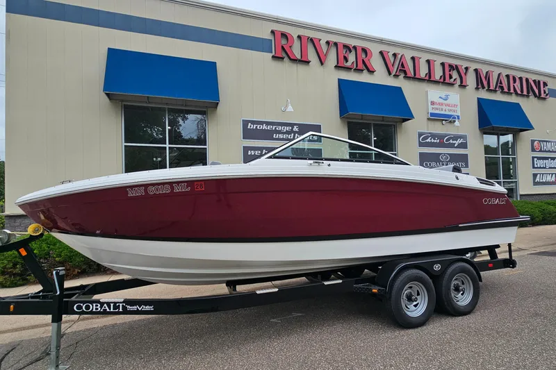 The Image of 2023 Cobalt R4 boat on trailer at River Valley Marine dealership. - 1