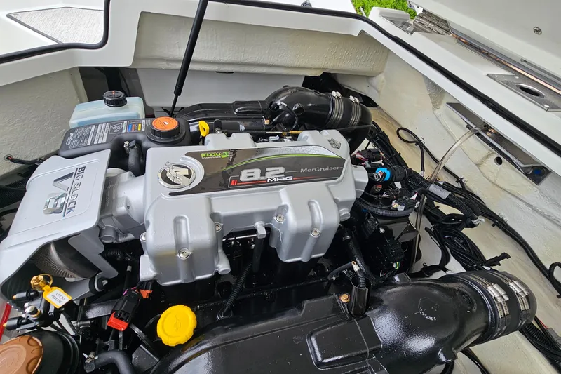 Slide: The Image of Engine compartment of 2023 Cobalt R4 boat featuring MerCruiser 8.2L V8 engine. - 29
