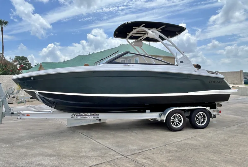 Slide: The Image of A sleek 2027 Cobalt R4 boat on a trailer, ready for adventure. - 3