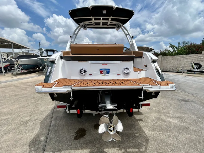 Slide: The Image of The image shows the stern of a 2027 Cobalt R4 boat with sleek design and modern features. - 11