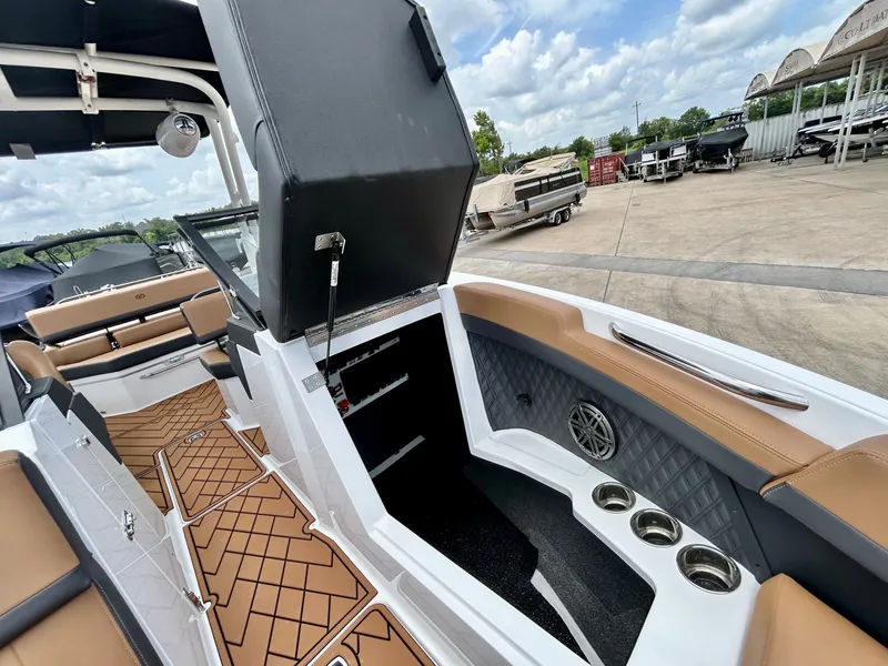 Slide: The Image of The image shows the interior of a 2027 Cobalt R4 boat with sleek seating and modern details. - 25