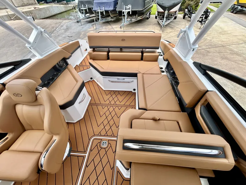 Slide: The Image of The image shows the luxurious interior of a Cobalt R4 boat with sleek beige upholstery. - 41
