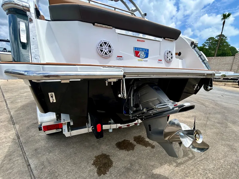 Slide: The Image of The image shows the stern of a 2027 Cobalt R4 boat with an outboard motor. - 12
