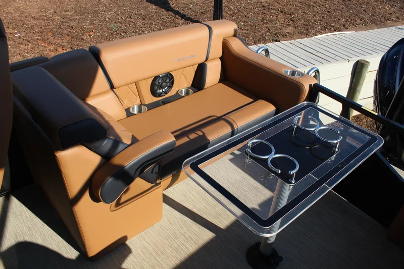 Slide: The Image of Luxurious seating and table setup on 2025 Veranda VTX 22RC pontoon boat. - 8