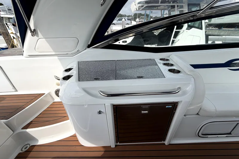 Slide: The Image of 2008 Formula 350 Sun Sport boat interior with sleek countertop and cup holders. - 12