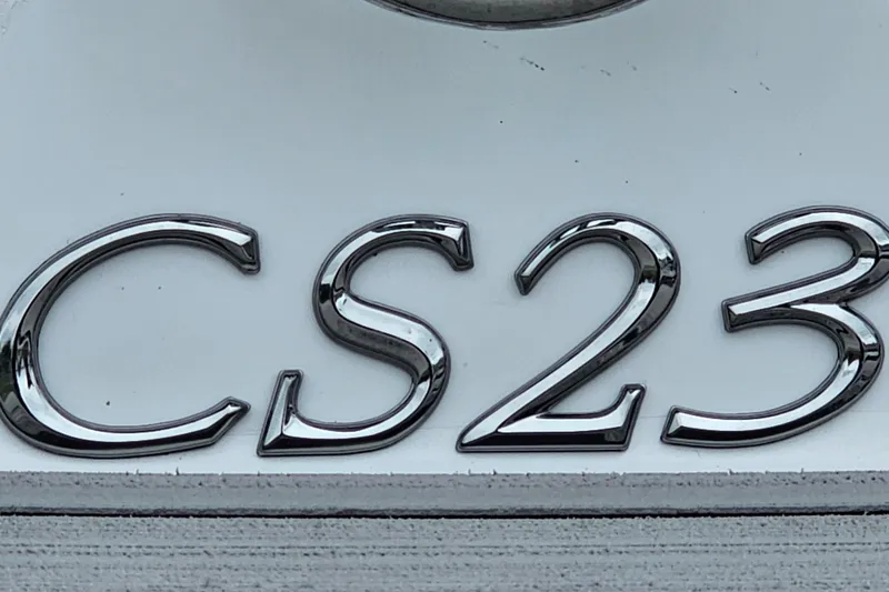 Slide: The Image of Chrome emblem of 2022 Cobalt CS23 model on a white surface. - 23