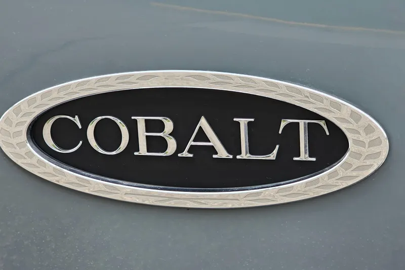 Slide: The Image of Cobalt CS23 2022 emblem on a sleek gray surface. - 24