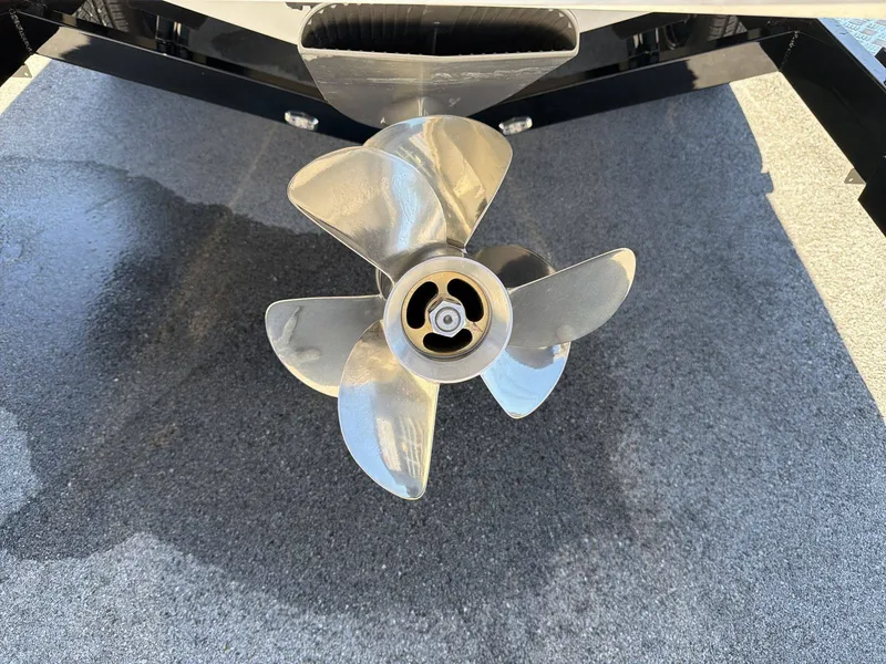 Slide: The Image of Close-up of a shiny propeller on a 2026 Regal LS9 boat. - 29