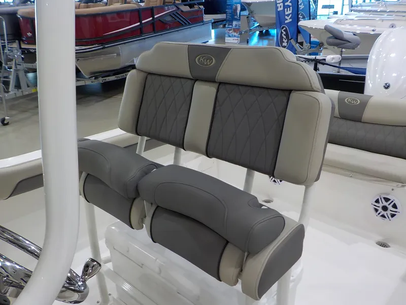 Slide: The Image of The 2027 Key West 239 FS features a cushioned bench seat with gray and beige upholstery. - 15