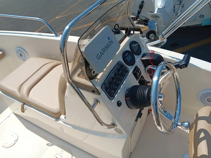 Slide: The Image of The image shows the cockpit of a 2020 Scout 175 Sport Dorado with Garmin navigation. - 8
