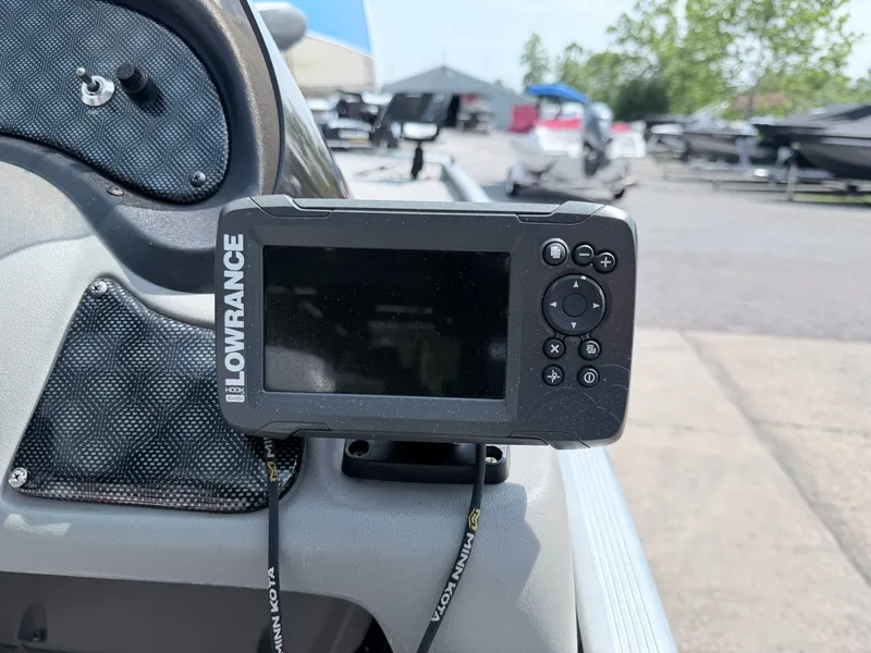 Slide: The Image of A Lowrance fish finder is mounted on a Tracker Pro 165 boat. - 16
