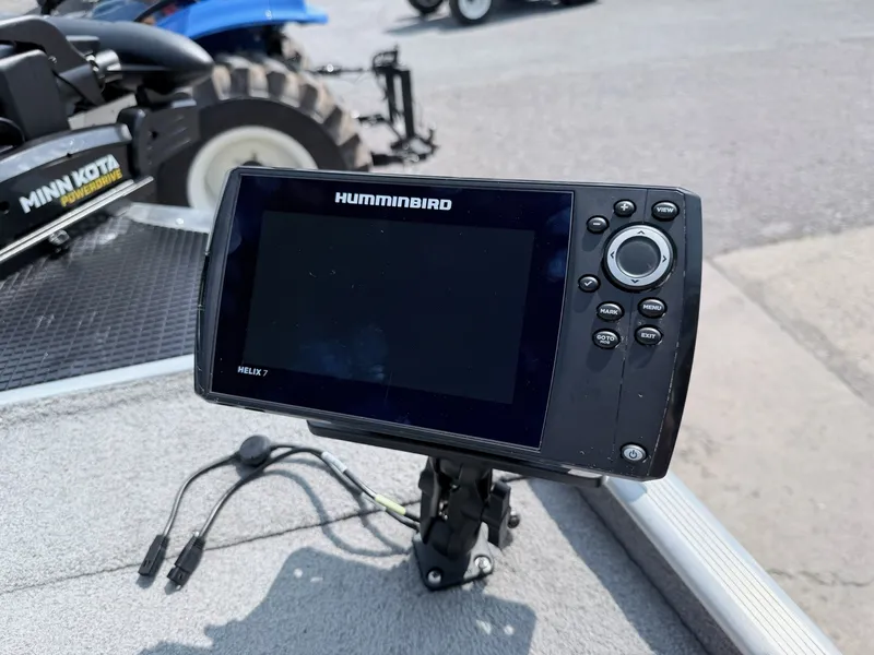 Slide: The Image of A Humminbird Helix 7 fish finder is mounted on a Tracker Pro 165 boat. - 17