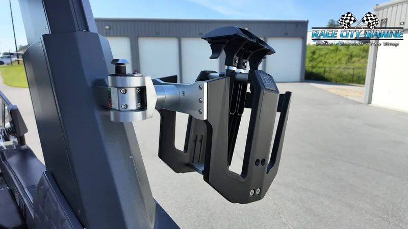 Slide: The Image of A wakeboard holder on a boat, mounted on a sturdy metal arm. - 34