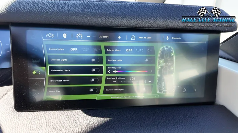 Slide: The Image of The image shows a digital control display on a boat, featuring various lighting options. - 21