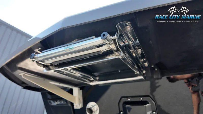 Slide: The Image of Close-up of a boat detail showing a mechanical component beneath the hull. - 37