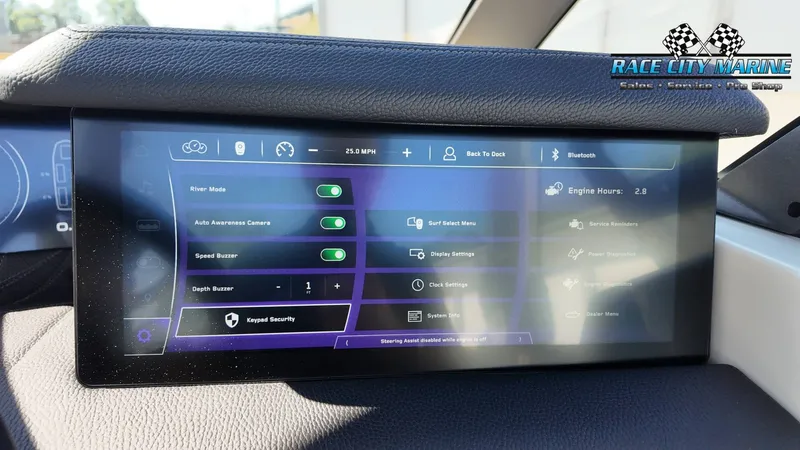 Slide: The Image of The image shows a digital dashboard with various settings and displays for a boat. - 23