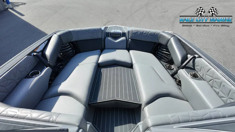 Slide: The Image of The image shows the luxurious gray upholstery of the 2022 Super Air Nautique G25 Paragon. - 25