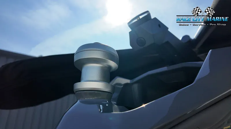 Slide: The Image of Close-up of a part of a Nautique Super Air Nautique G25 Paragon boat, with clear sky background. - 36