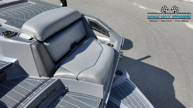 Slide: The Image of Gray upholstery on a modern boat with cup holders and speakers. - 40