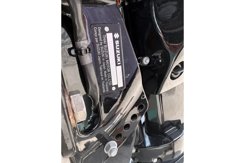 Slide: The Image of Close-up of a Suzuki motor label on a 2025 Exuma 14 Snookaholic. - 31