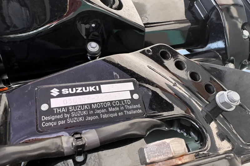 Slide: The Image of Close-up of a Suzuki motor label on a 2025 Exuma 14 Snookaholic. - 31