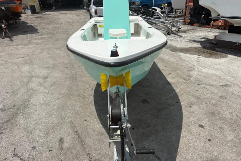 Slide: The Image of Exuma 14 Snookaholic 2025 boat on trailer in outdoor setting. - 3