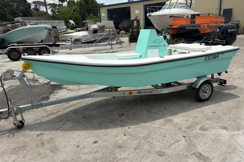 Slide: The Image of 2025 Exuma 14 Snookaholic boat on trailer in outdoor storage area. - 9