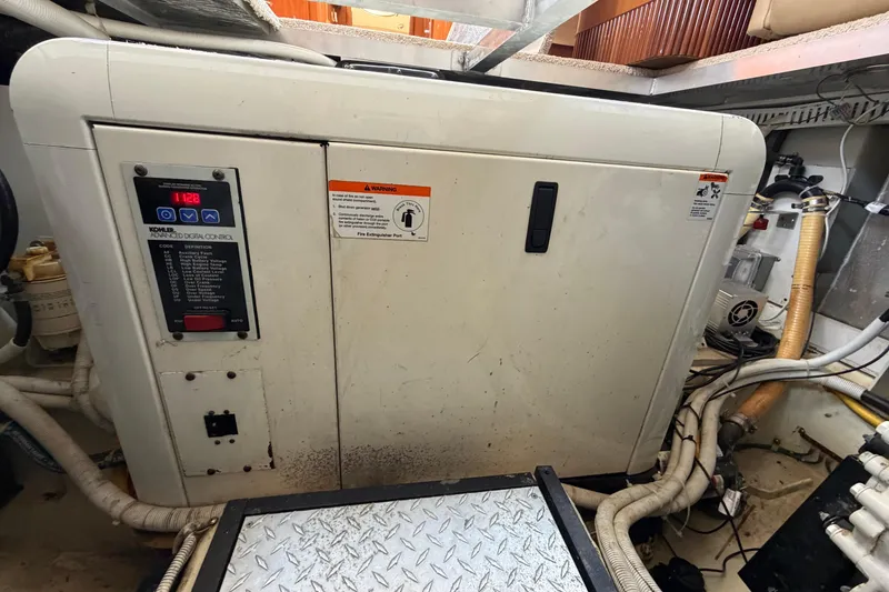 Slide: The Image of Engine room of 2005 Carver 396 Aft Cabin Motor Yacht with Kohler generator. - 20