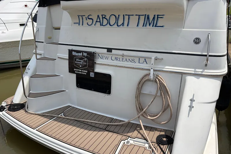 Slide: The Image of 2005 Carver 396 Aft Cabin Motor Yacht docked, New Orleans, LA, with "It's About Time" text. - 22