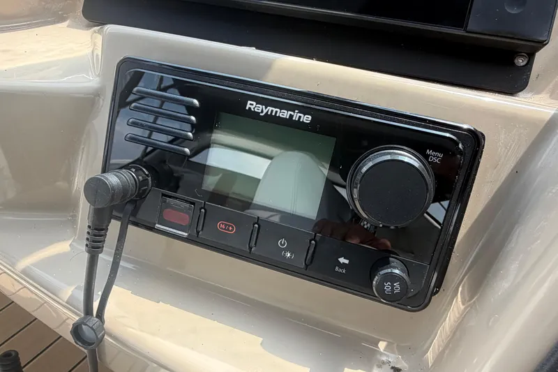 Slide: The Image of Raymarine control panel on 2005 Carver 396 Aft Cabin Motor Yacht dashboard. - 6
