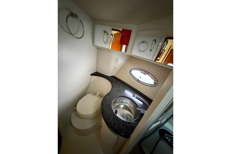 Slide: The Image of Bathroom interior of 2005 Carver 396 Aft Cabin Motor Yacht with sink and toilet. - 17